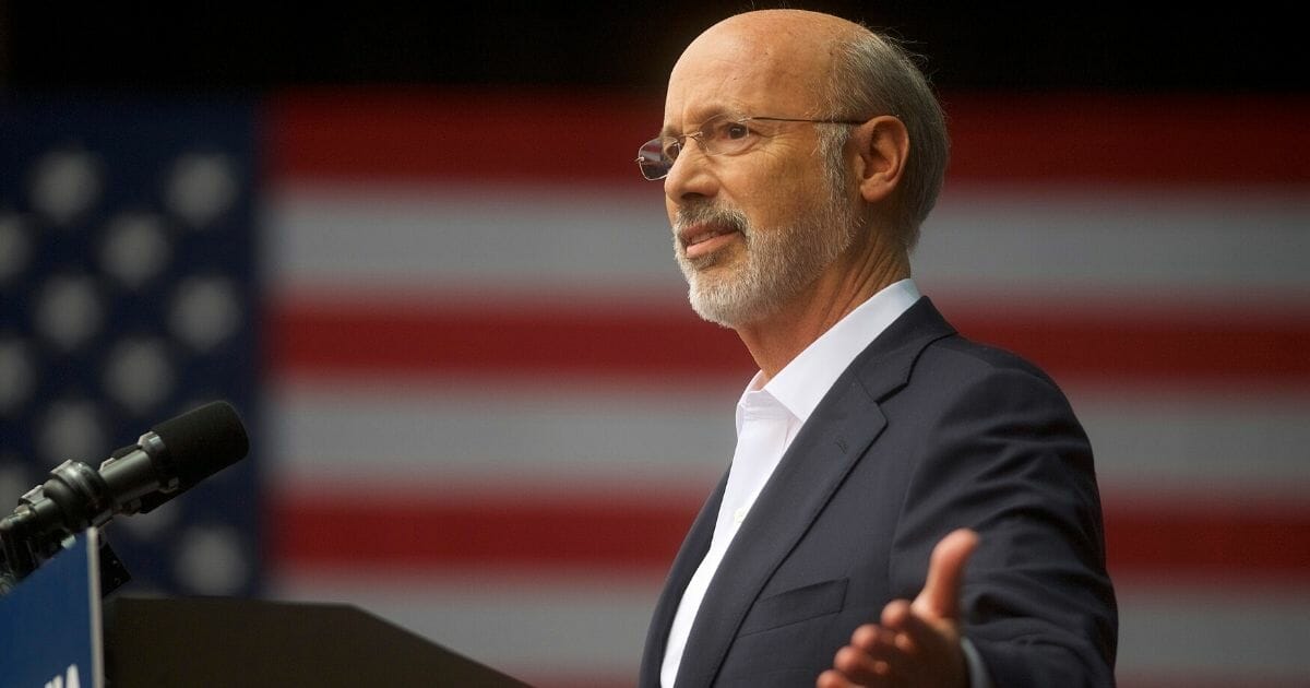 Pennsylvania Gov. Tom Wolf addresses supporters before former President Barack Obama speaks during a campaign rally for statewide Democratic candidates on Sept. 21, 2018, in Philadelphia.