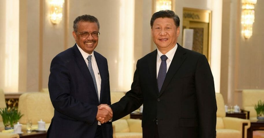 World Health Organization Director-General Tedros Adhanom Ghebreyesus, left, shakes hands with Chinese President Xi Jinping before a meeting at the Great Hall of the People in Beijing on Jan. 28, 2020.