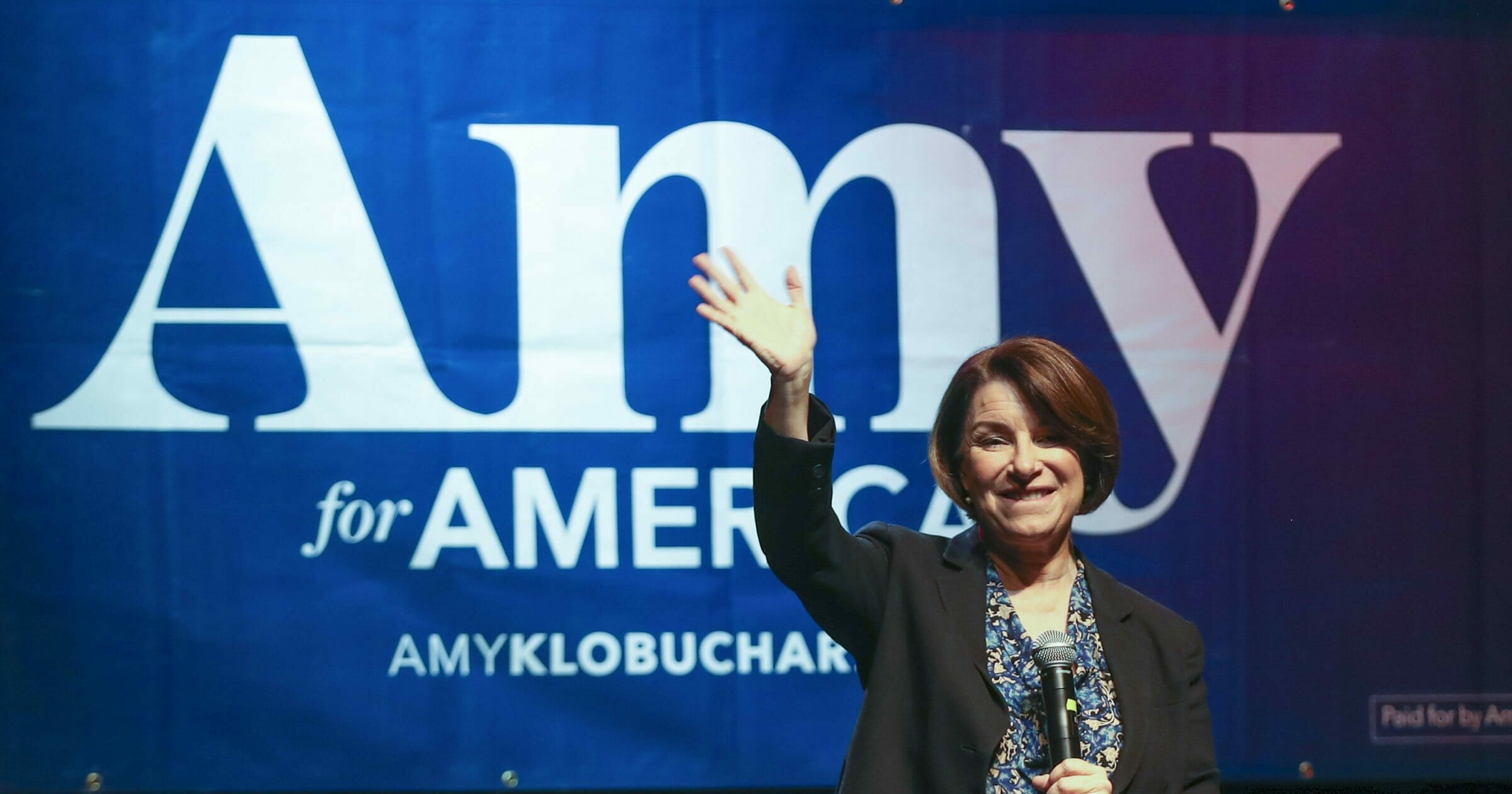 Former Democratic presidential candidate Sen. Amy Klobuchar of Minnesota waves to her supporters after speaking during her presidential campaign rally at The Depot in Salt Lake City on March 2, 2020.