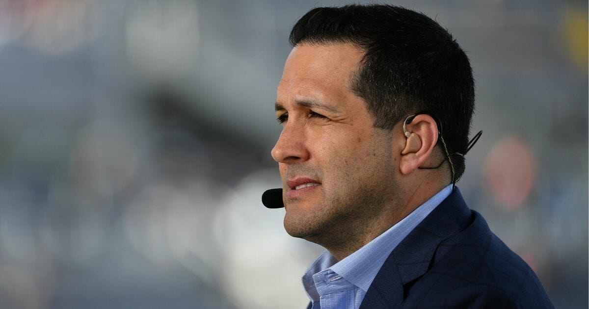 ESPN's Adam Schefter looks on during the 2020 NFL Pro Bowl at Camping World Stadium in Orlando, Florida, on January 26, 2020.