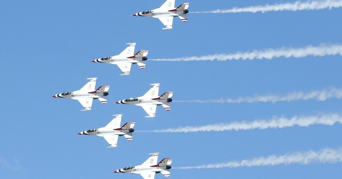 The U.S. Air Force Air Demonstration Squadron Thunderbirds perform a flyover in honor of front-line responders in the fight against the coronavirus on April 11, 2020, in North Las Vegas, Nevada.