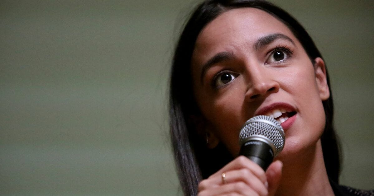 Rep. Alexandria Ocasio-Cortez (D-New York) speaks during a Green New Deal for Public Housing town hall on Dec. 14, 2019, in the Queens borough of New York City.