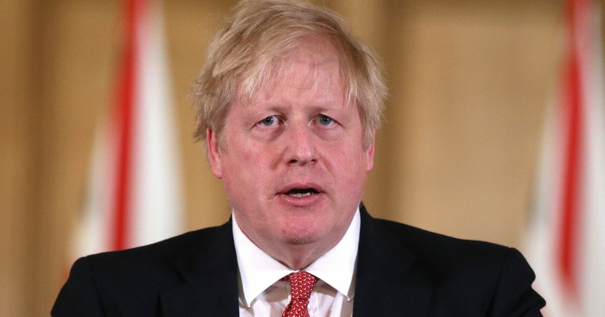 British Prime Minister Boris Johnson gives his daily COVID-19 news briefing at Downing Street in London on March 22, 2020.