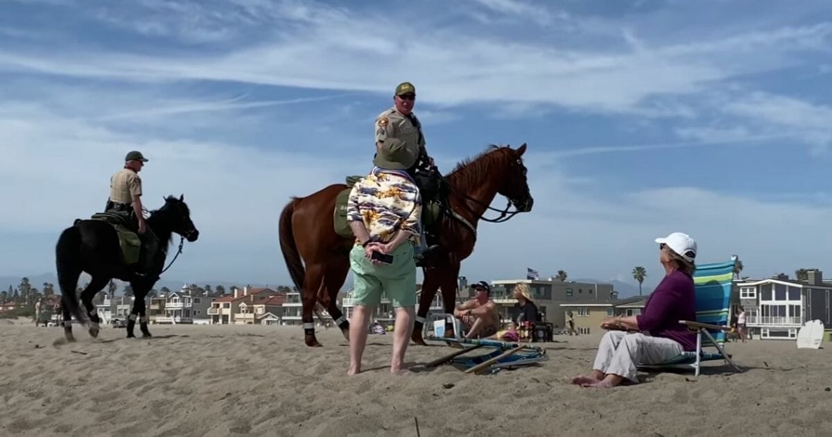 According to the report, the problem arose because setting up a folding chair in the sand created a "permanent place" as opposed to the more "temporary nature" of resting in the sand, according to police.