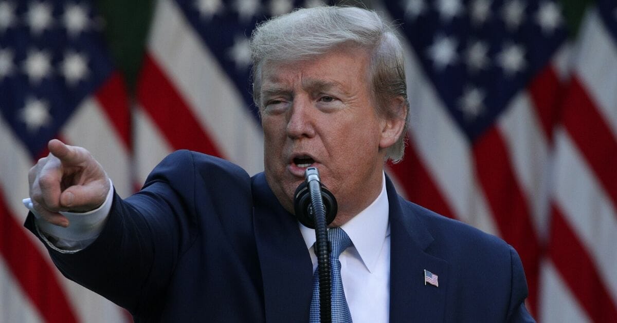President Donald Trump speaks at the daily briefing of the White House coronavirus task force in the Rose Garden at the White House on April 15, 2020, in Washington, D.C.