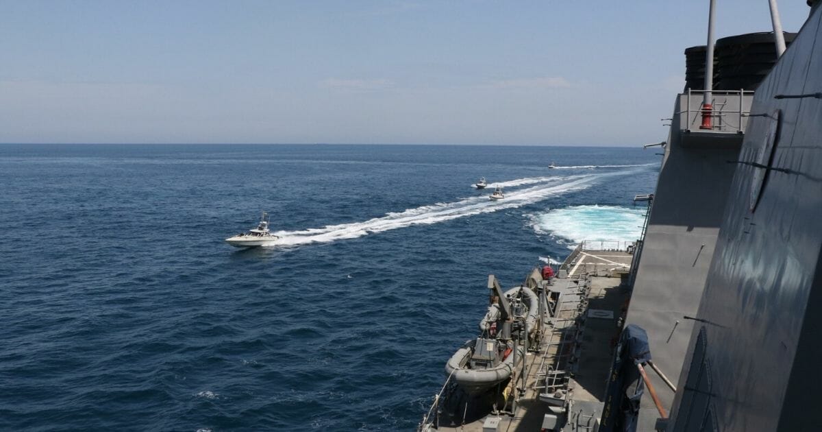 An Iranian vessel comes near a U.S. Navy ship.