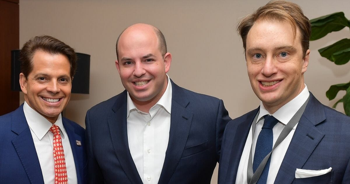 Vanity Fair correspondent and NBC News contributor Gabriel Sherman, right, poses with financier Anthony Scaramucci, left, and Brian Stelter, CNN's chief media correspondent, at Vanity Fair's New Establishment Summit at the Wallis Annenberg Center for the Performing Arts in Beverly Hills, California, on Oct. 22, 2019.