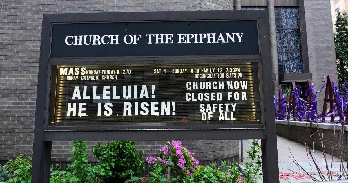 A sign outside the Church of the Epiphany in Gramercy Park is displayed during the coronavirus pandemic on April 14, 2020, in New York City.
