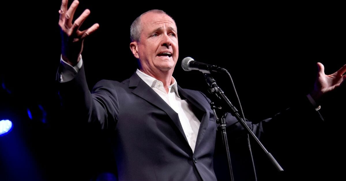 New Jersey Gov. Phil Murphy speaks onstage at Asbury Lanes on June 18, 2018, in Asbury Park, New Jersey.