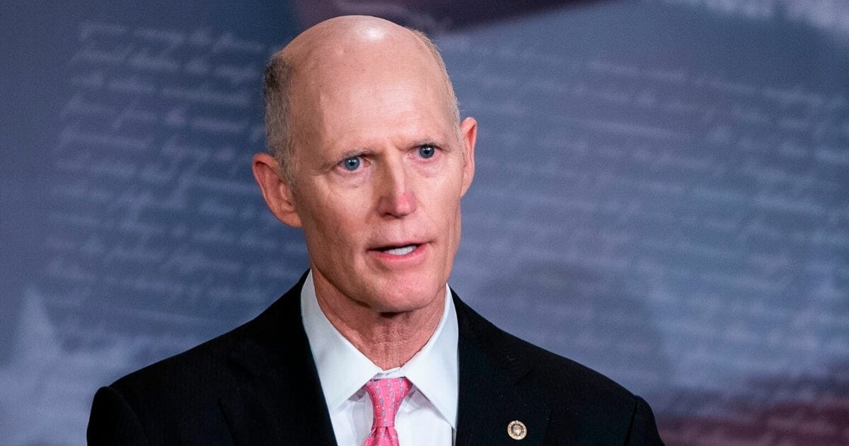 Republican Sen. Rick Scott of Florida speaks during a news conference at the Capitol on March 25, 2020.