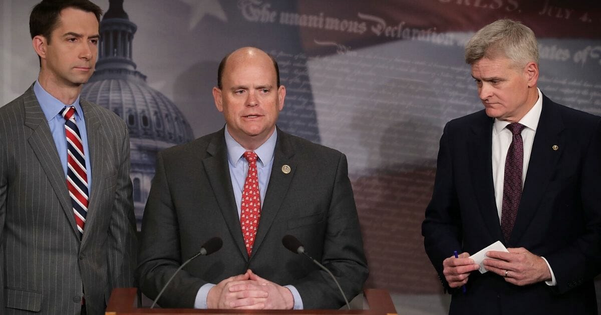 Republican Rep. Tom Reed of New York, center, shown with GOP Sens. Tom Cotton of Arkansas, left, and Sen. Bill Cassidy of Louisiana during a 2018 news conference at the Capitol, is co-chairman of a bipartisan group seeking common ground on America's recovery from the COVID-19 pandemic.