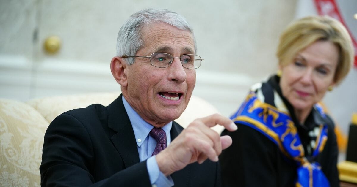 Dr. Anthony Fauci, left, director of the National Institute of Allergy and Infectious Diseases, speaks next to Coronavirus Task Force Response Coordinator Dr. Deborah Birx during a meeting with President Donald Trump and Louisiana Gov. John Bel Edwards in the Oval Office of the White House in Washington, D.C., on April 29, 2020.