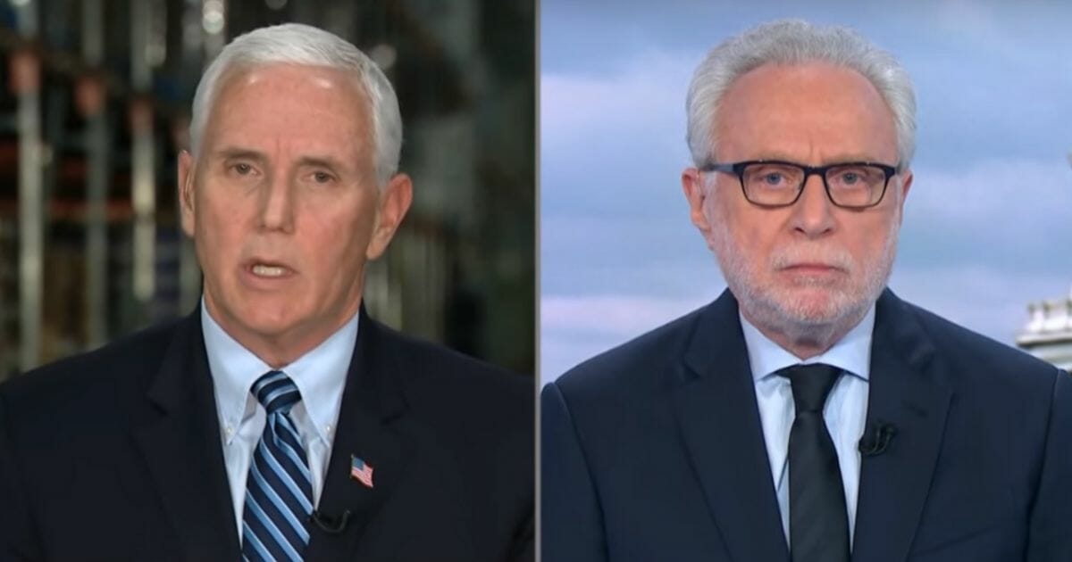 CNN’s Wolf Blitzer interviews Vice President Mike Pence on April 1, 2020.