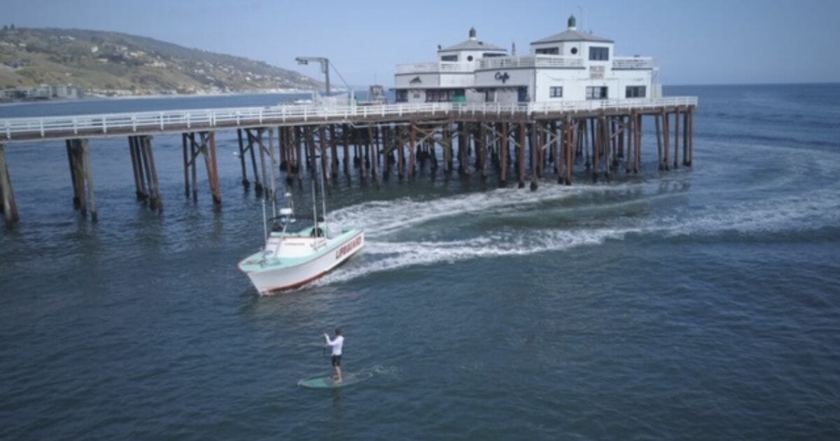 A paddleboarder was arrested in California on April 2, 2020, for not following the state’s stay-at-home order.