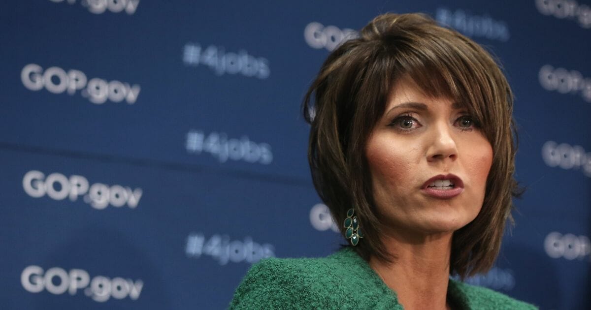South Dakota Gov. Kristi Noem, then the representative for the state’s at-large district, speaks during a news briefing after a House Republican Conference meeting on Jan. 14, 2014, on Capitol Hill.