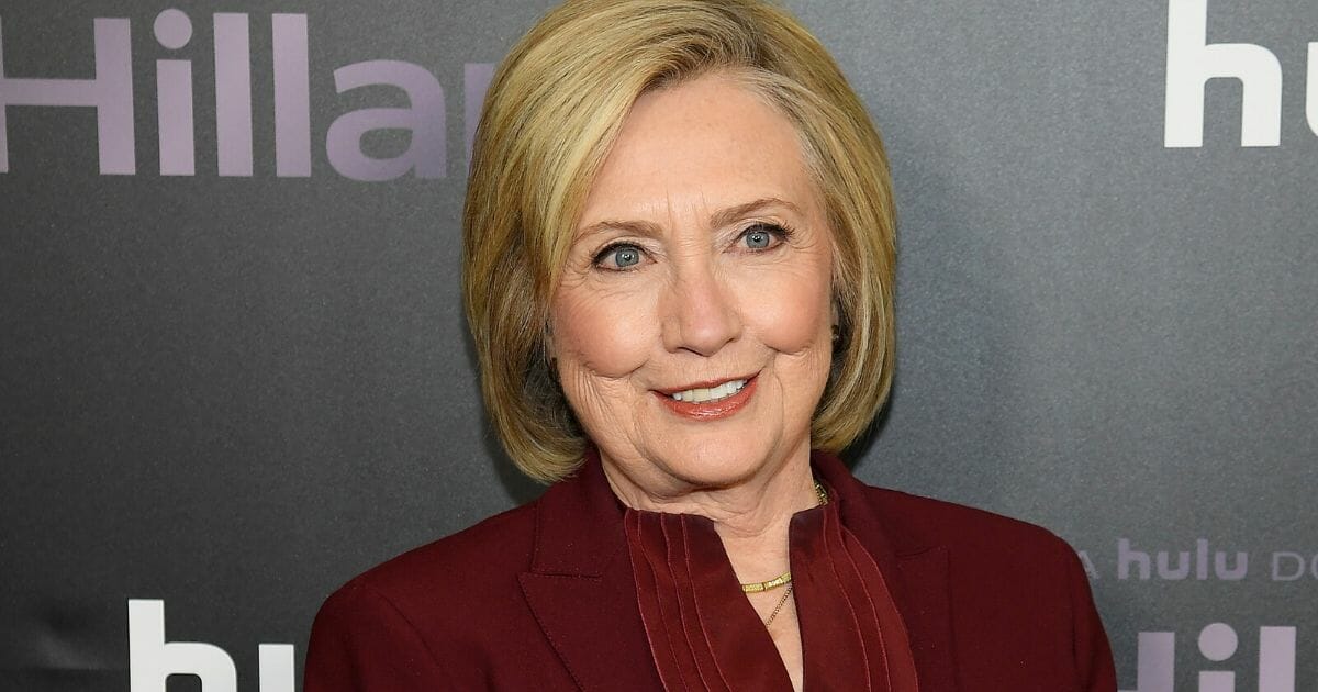 Former Democratic presidential candidate Hillary Clinton grins while attending the premiere of a documentary about her life, "Hillary," in New York City in March.