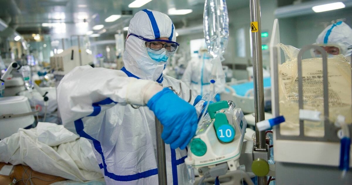 A nurse readies equipment for use in an intensive care unit of a hospital in Wuhan, China, the region that gave birth to the worldwide pandemic.