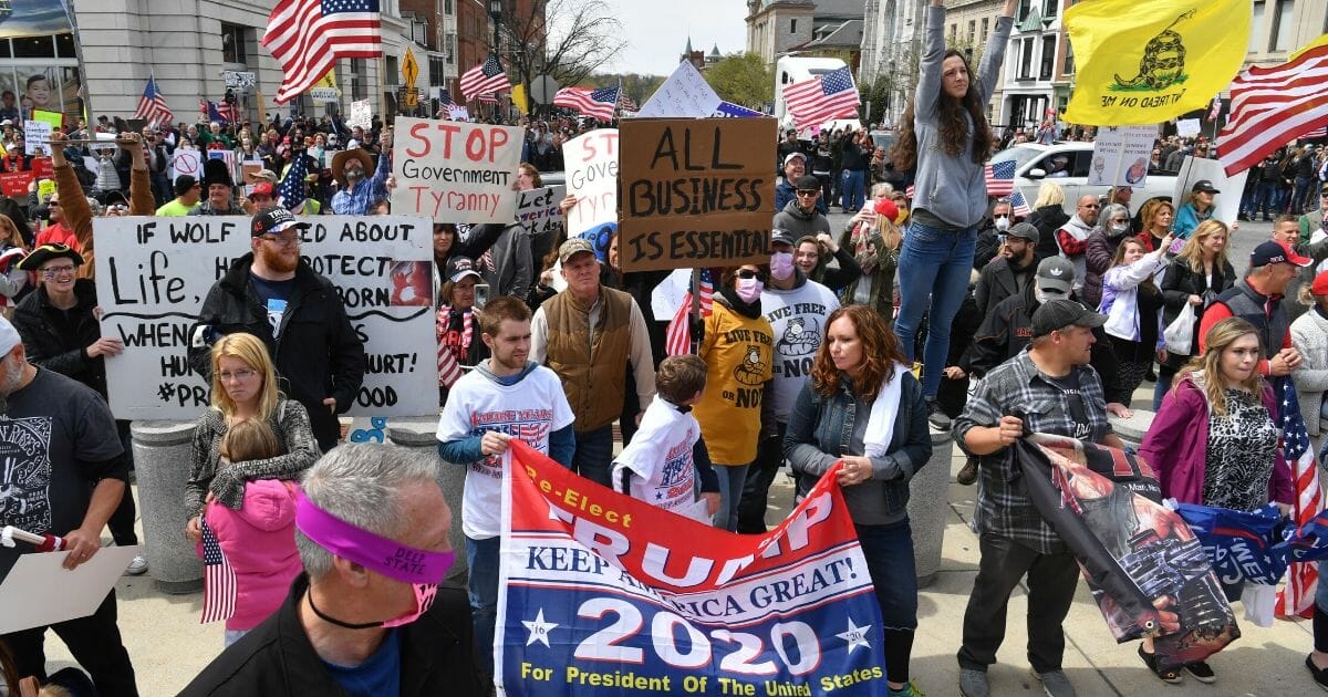 People take part in a “Reopen Pennsylvania” demonstration on April 20, 2020, in Harrisburg, Pennsylvania.