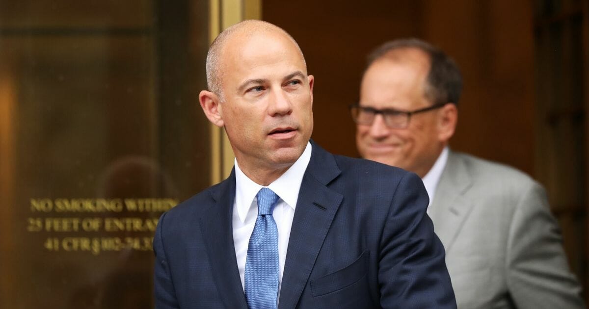 Celebrity attorney Michael Avenatti walks out of a New York courthouse after a hearing in a case in which he is accused of stealing $300,000 from former client pornographic film star Stormy Daniels on July 23, 2019, in New York City.