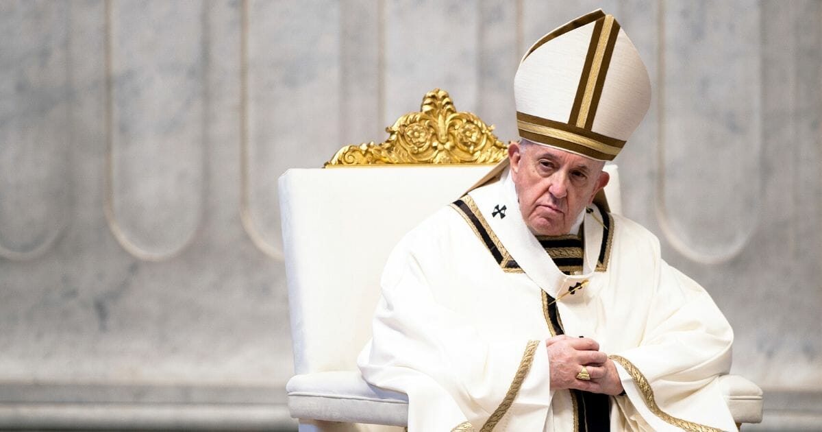 Pope Francis leads the solemn Easter Mass behind closed doors at St. Peter’s Basilica on April 12, 2020 in the Vatican.