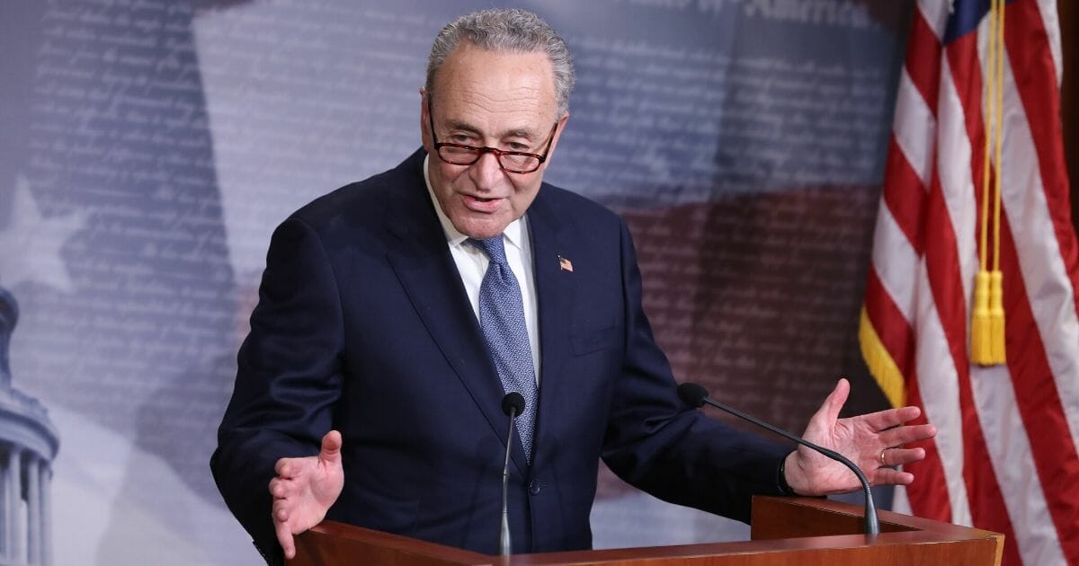 Senate Minority Leader Charles Schumer talks to reporters at the U.S. Capitol on April 21, 2020.