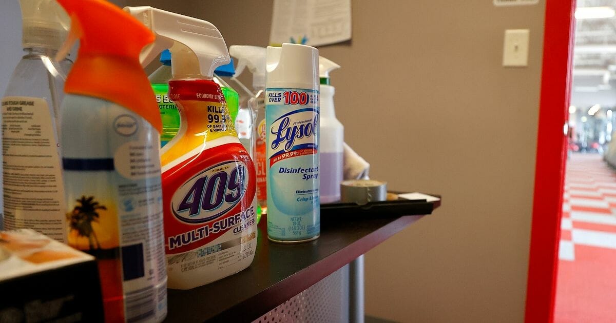 An array of cleaning products on a table.