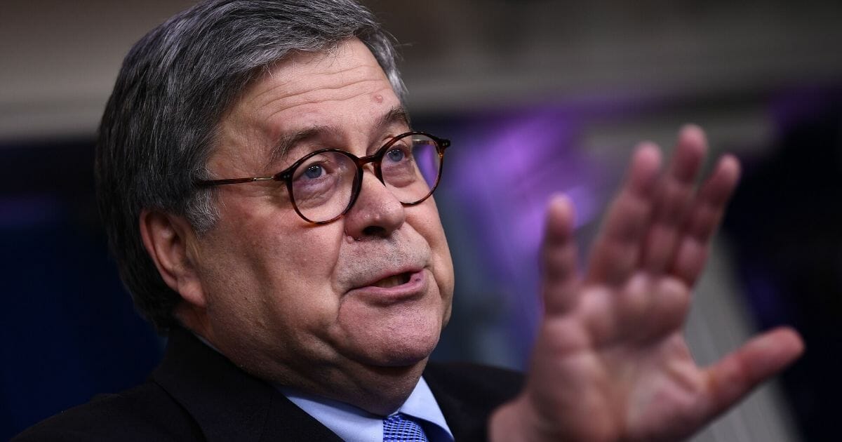 U.S. Attorney General William Barr gestures as he speaks during the daily coronavirus, briefing at the White House on March 23, 2020.