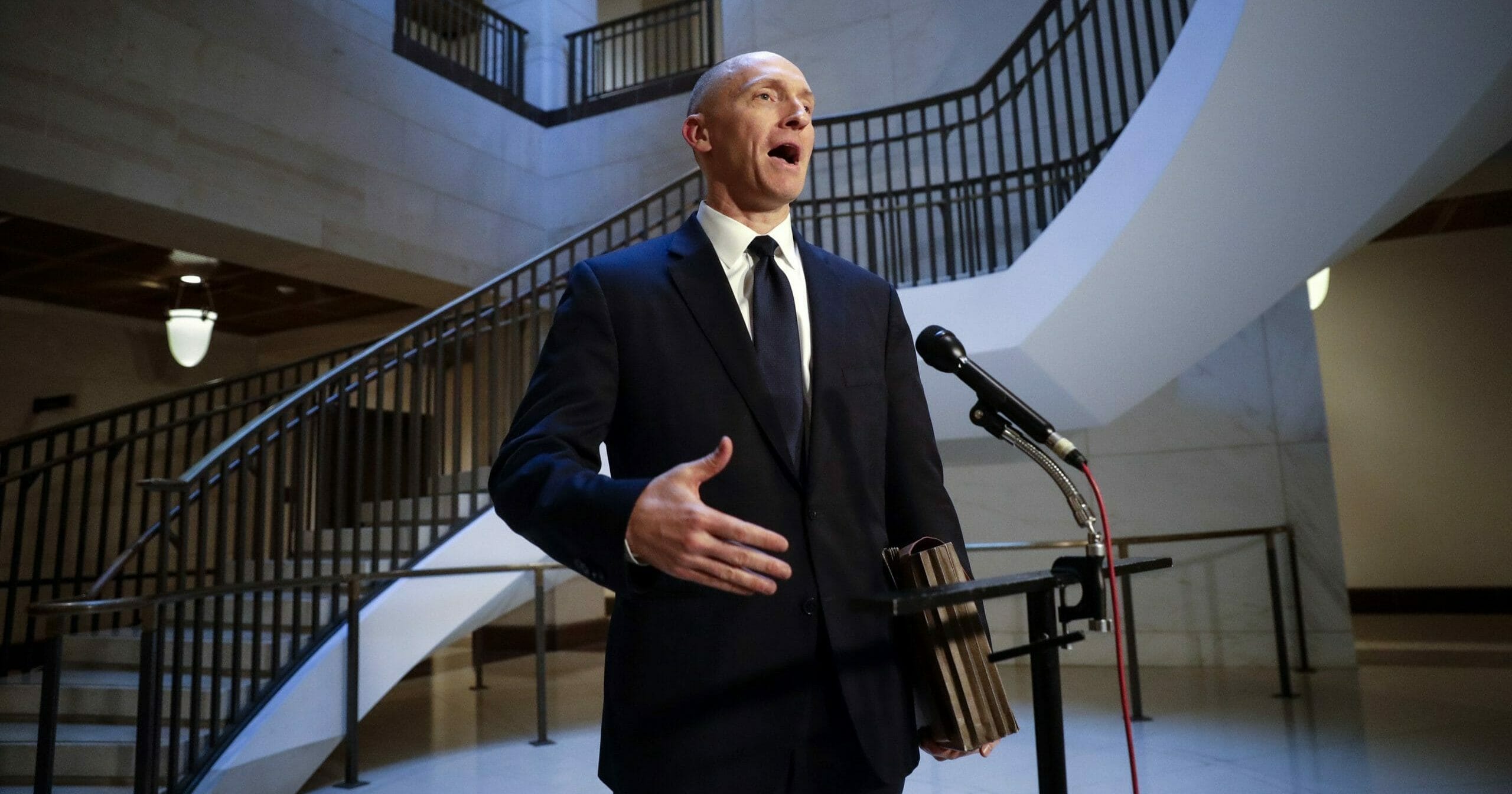 In a Nov. 2, 2017, file photo, Carter Page, a foreign policy adviser to Donald Trump's 2016 presidential campaign, speaks with reporters following a day of questions from the House Intelligence Committee, on Capitol Hill in Washington.