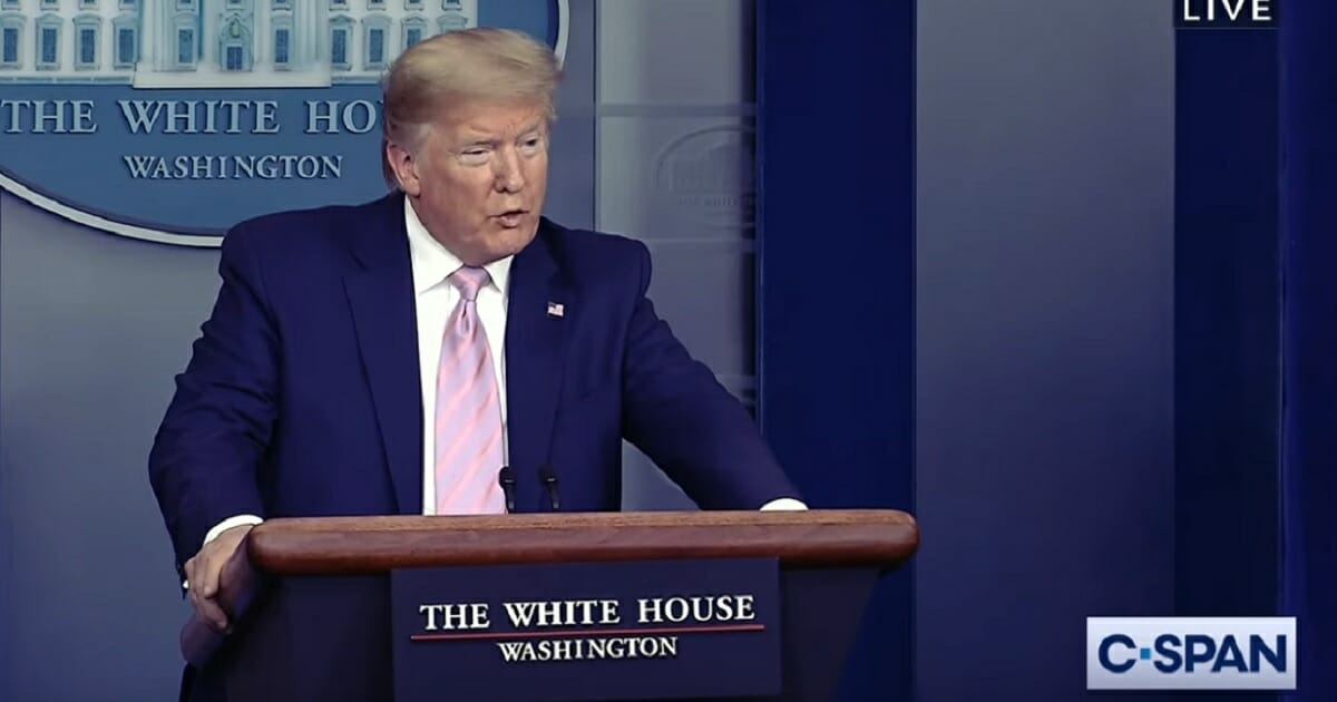President Donald Trump addresses reporters during a White House briefing on Saturday.