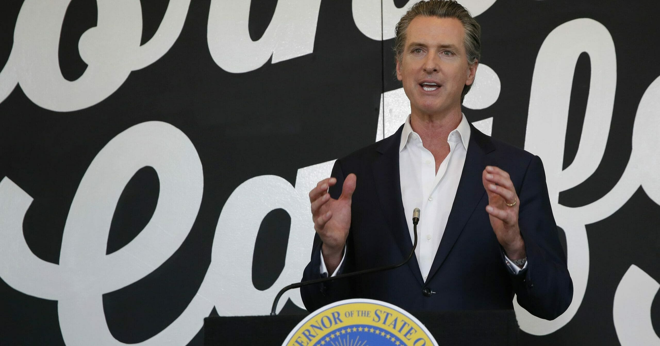 Gov. Gavin Newsom discusses his plan for the gradual reopening of California businesses during a news conference at the Display California store in Sacramento, California, on May 5, 2020.
