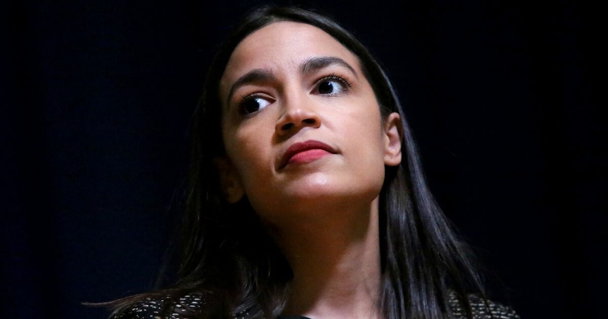 Democratic Rep. Alexandria Ocasio-Cortez takes questions during a Green New Deal forum in the Queens borough of New York City on Dec. 14, 2019.