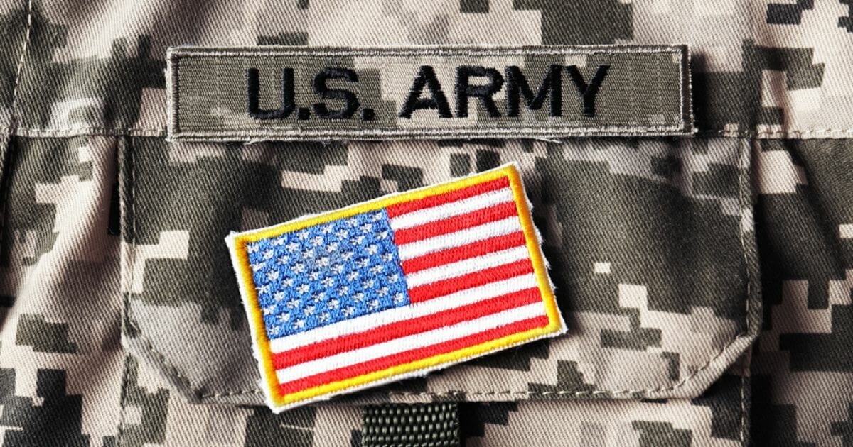A stock photo of a U.S. army uniform is a seen above.