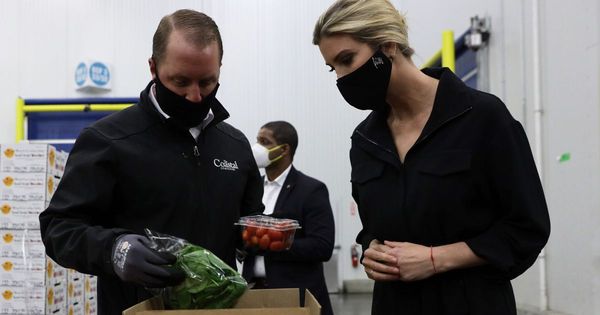 Director of Value Added of Coastal Sunbelt Produce Brian Trojanowski shows the content of a food box to Ivanka Trump