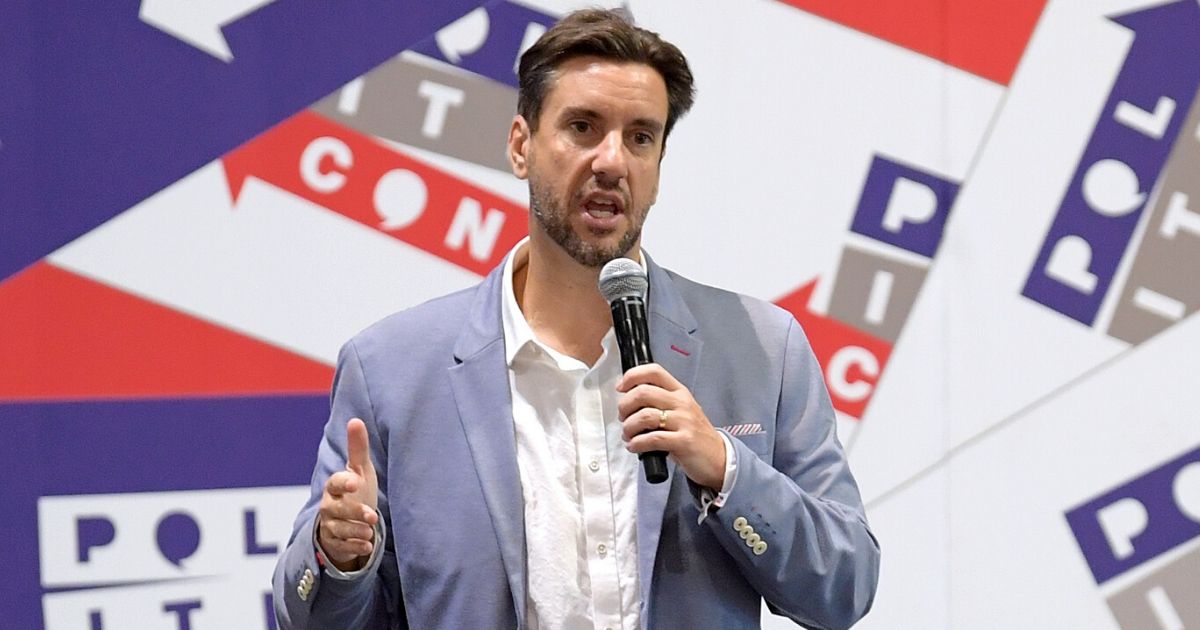 Clay Travis speaks onstage during Politicon at the Music City Center in Nashville on Oct. 26, 2019.