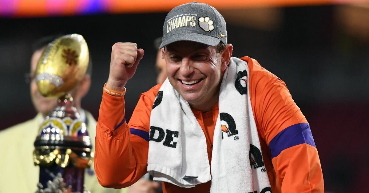 Clemson head football coach Dabo Swinney celebrates the Tigers' 29-23 win over the Ohio State Buckeyes in the College Football Playoff semifinal at State Farm Stadium in Glendale, Arizona, on Dec. 28, 2019.