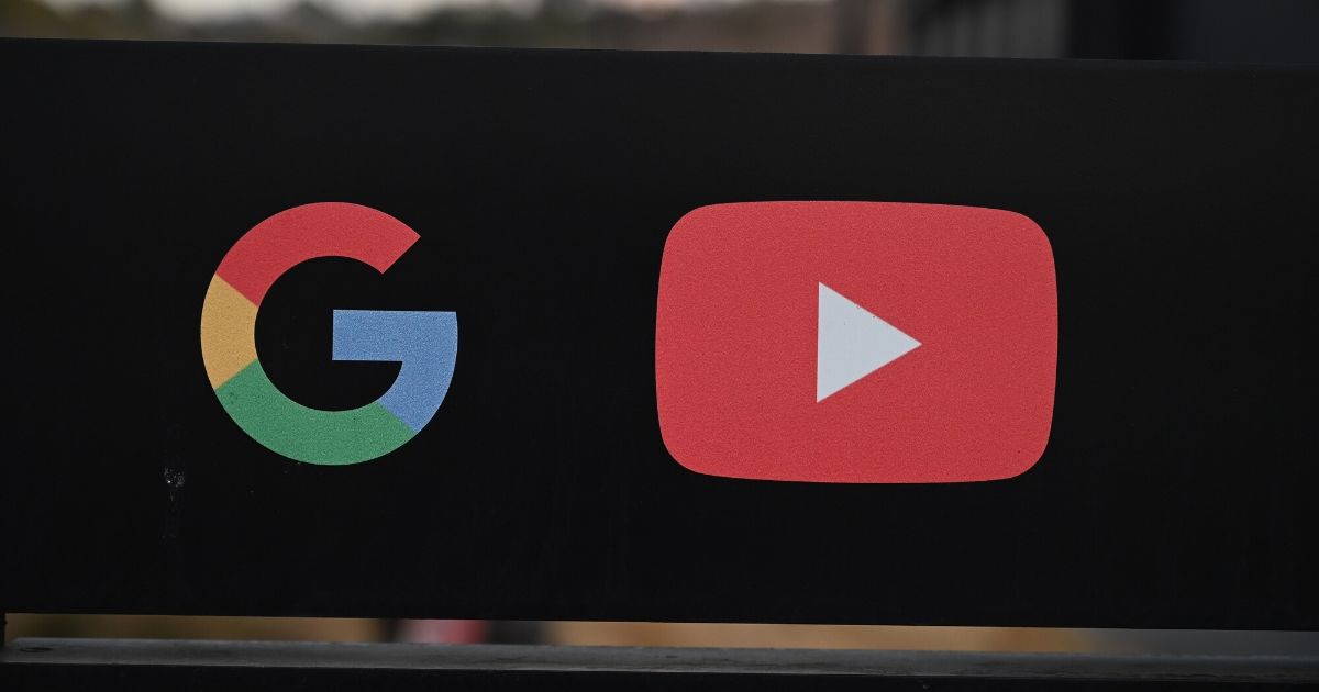 Google and YouTube logos are seen at the entrance to the Google offices in Los Angeles on Nov. 21, 2019.