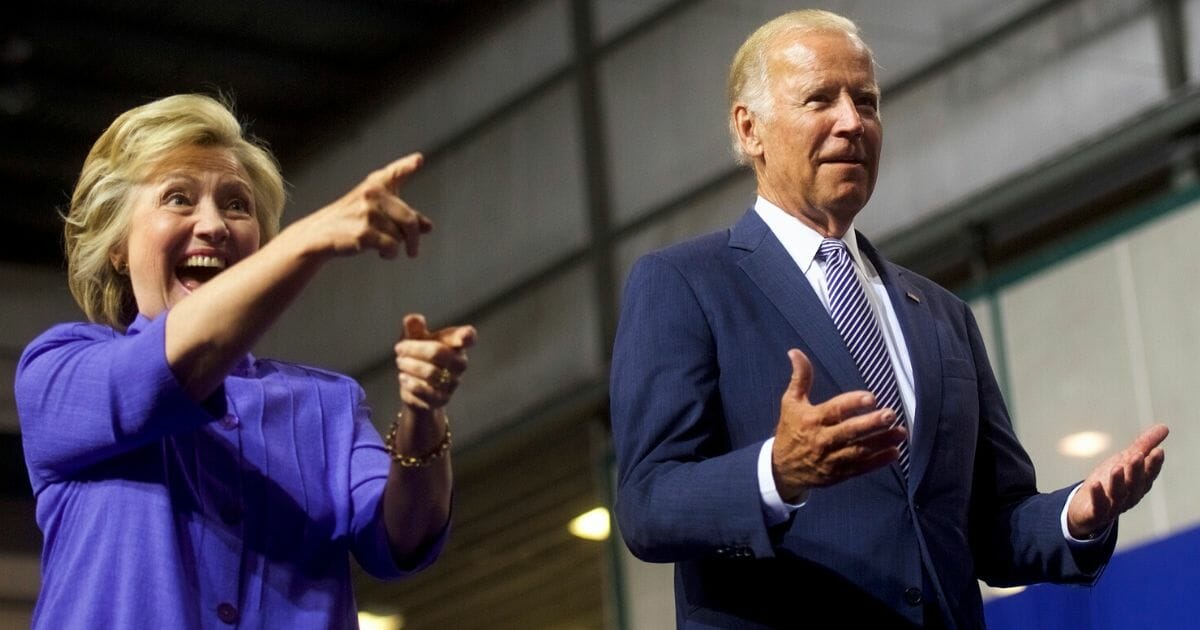 Hillary Clinton and Joe Biden -- then the Democratic presidential nominee and vice president, respectively -- react to the crowd at a campaign event in Scranton, Pennsylvania, on Aug. 15, 2016.