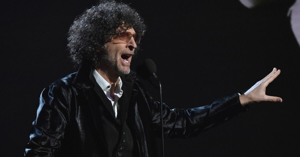 Howard Stern inducts Bon Jovi during the 33rd Annual Rock & Roll Hall of Fame Induction Ceremony at Public Auditorium on April 14, 2018, in Cleveland, Ohio.
