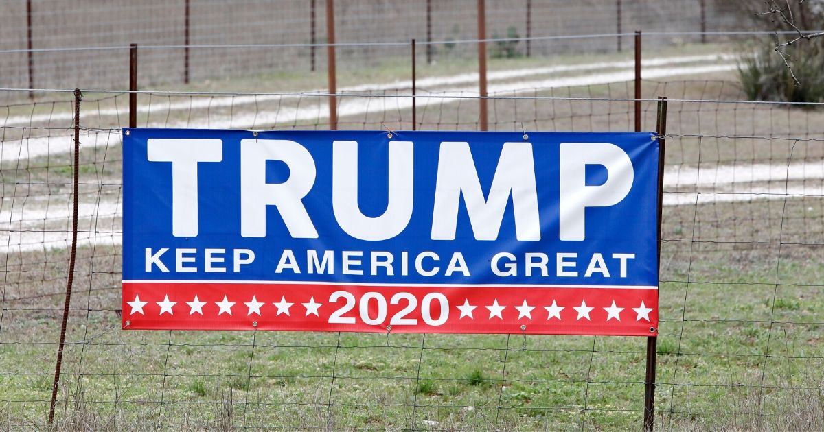 A "Keep America Great" sign along the highway on March 3, 2020, in Johnson City, Texas.
