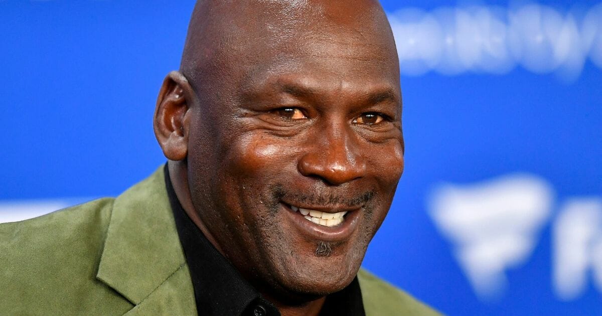 NBA legend Michael Jordan attends a news conference before a game between the Charlotte Hornets and Milwaukee Bucks in Paris on Jan. 24, 2020.