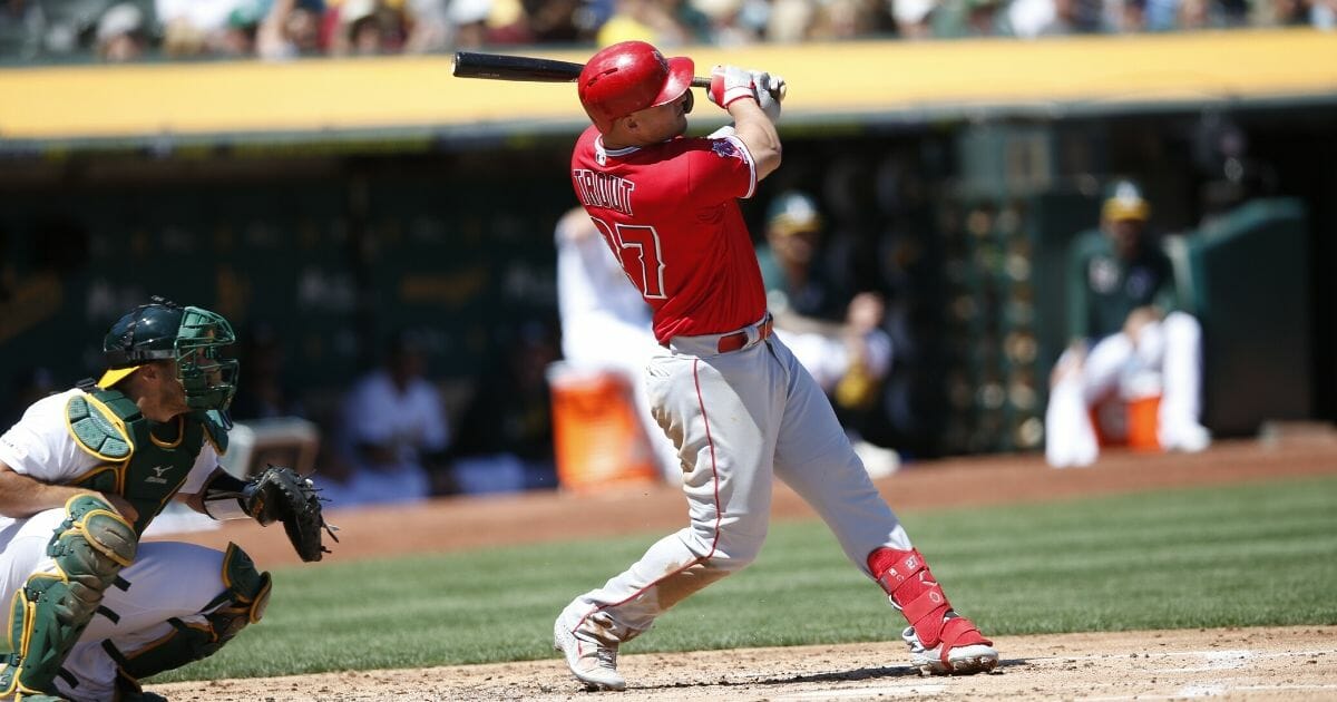 Mike Trout of the Los Angeles Angels of Anaheim hits a home run during a game against the Oakland Athletics at the Oakland-Alameda County Coliseum on Sept. 5, 2019.