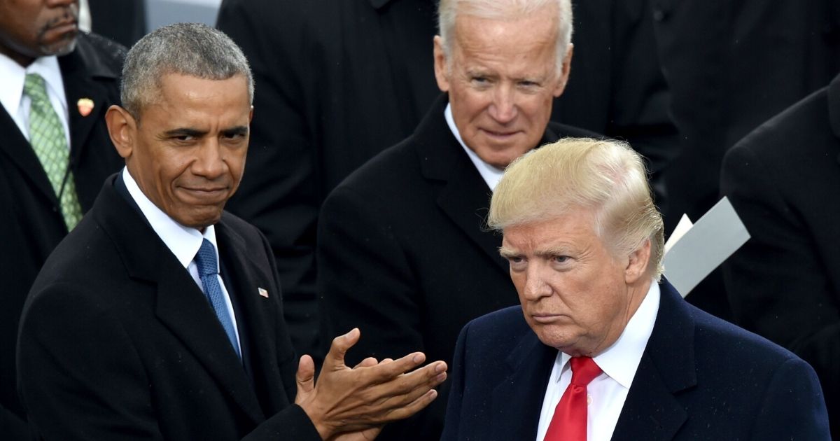 Former President Barack Obama and former Vice President Joe Biden applaud during President Donald Trump's inauguration ceremonies at the Capitol in Washington on Jan. 20, 2017