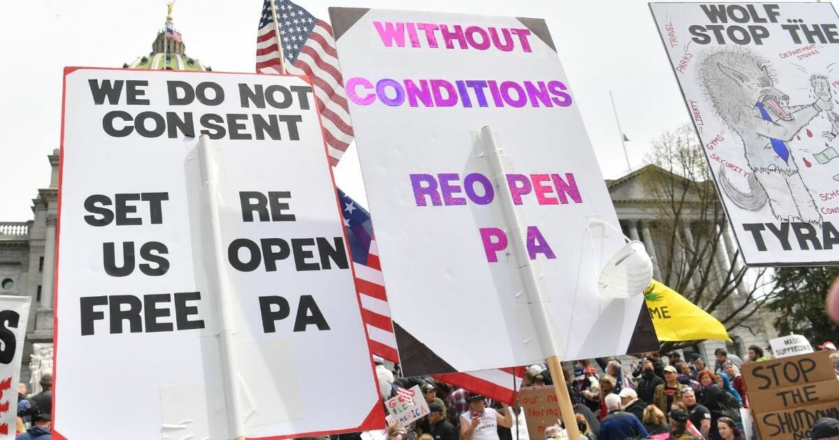 Protesters take part in a "reopen" Pennsylvania demonstration on April 20, 2020, in Harrisburg, Pennsylvania.