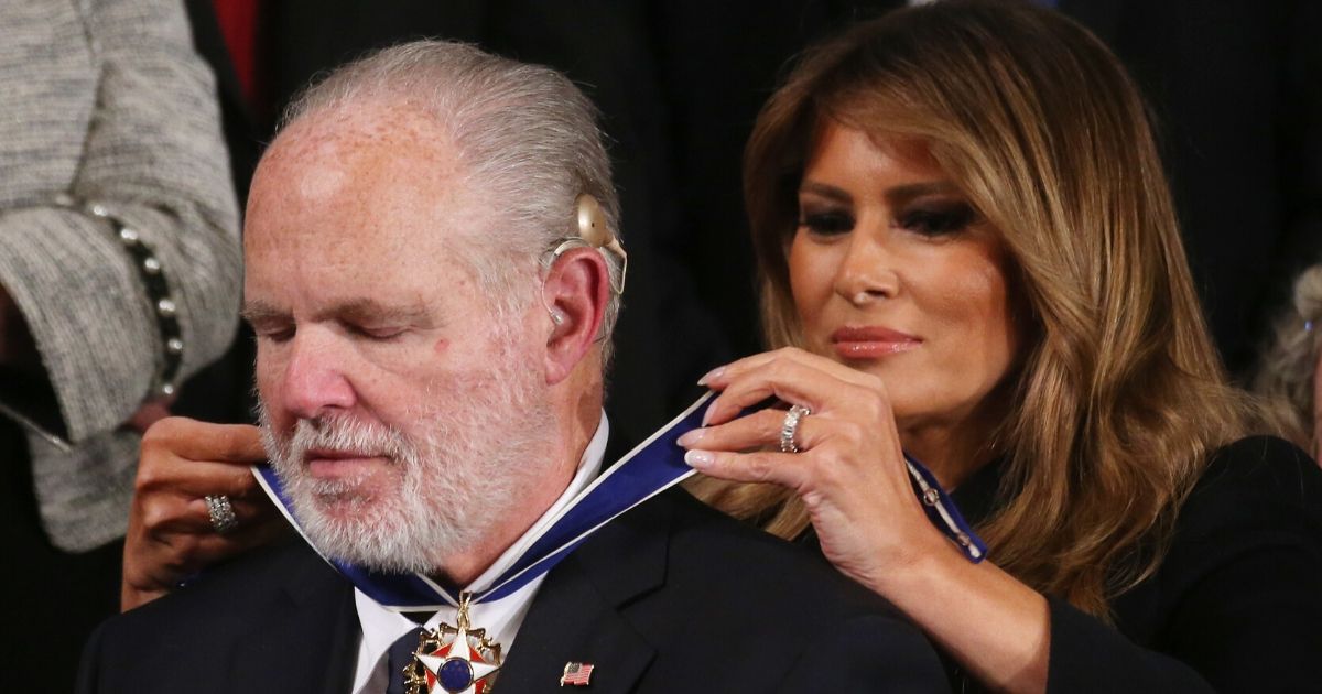 Radio personality Rush Limbaugh reacts as first lady Melania Trump gives him the Presidential Medal of Freedom during the State of the Union address in the chamber of the U.S. House of Representatives on Feb. 4, 2020, in Washington, D.C.