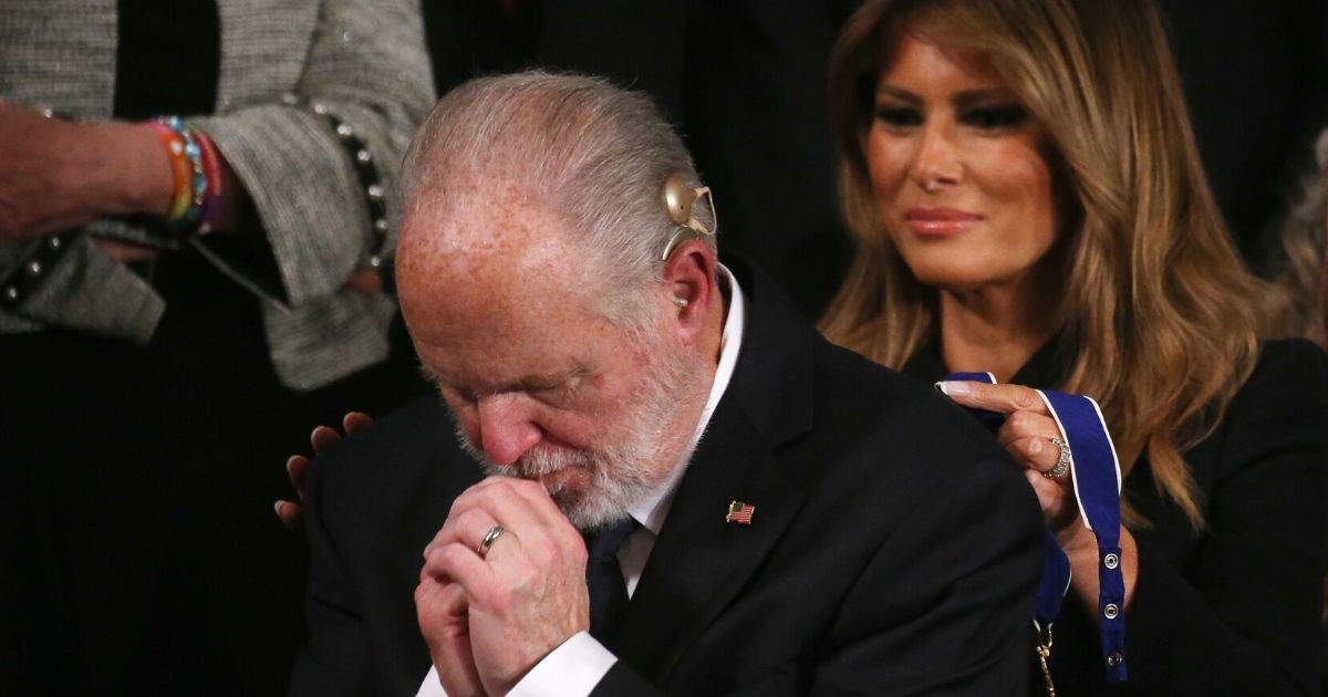 Radio personality Rush Limbaugh reacts as first lady Melania Trump prepares to give him the Presidential Medal of Freedom during the State of the Union address in the chamber of the U.S. House of Representatives on Feb. 4, 2020, in Washington, D.C.