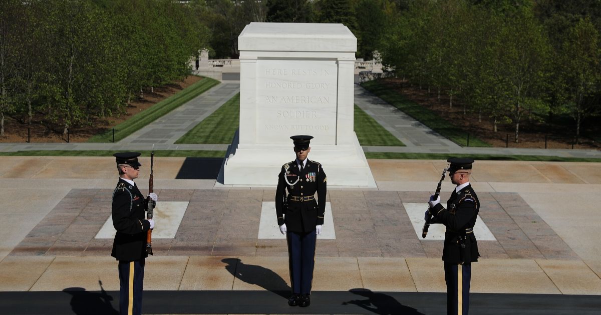 Soldiers from the U.S. Army 3rd Infantry Regiment, also called "The Old Guard," maintain social distancing to prevent the spread of the novel coronavirus while performing the changing of the guard at the Tomb of the Unknown Soldier in Arlington Cemetery in Virginia on April 22, 2020.