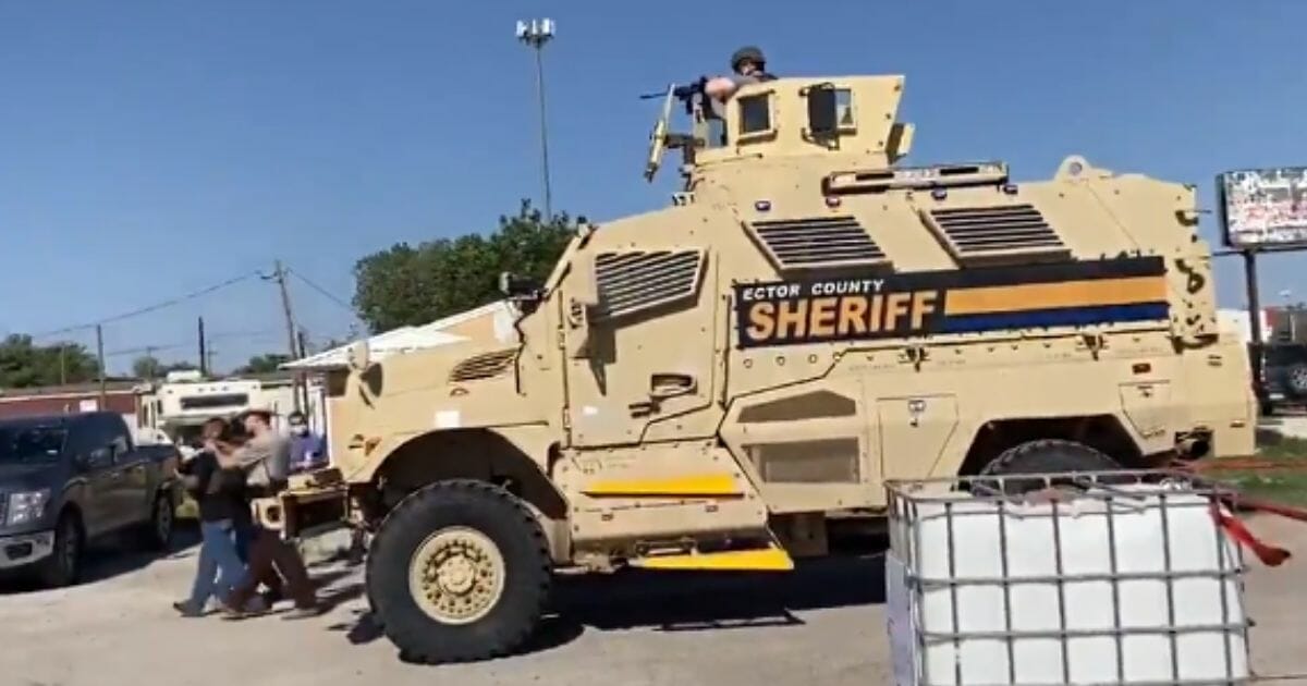 Ector County Sheriff's Office MRAP facing off against peaceful protesters.