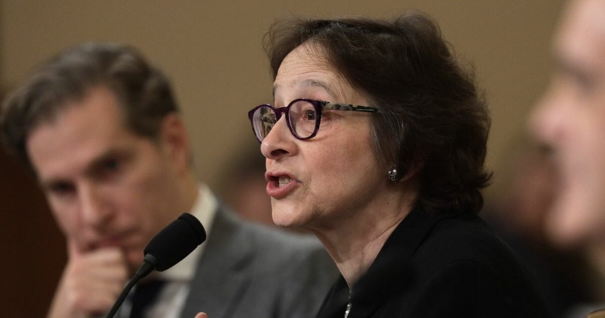 Constitutional scholars Pamela Karlan of Stanford University, right, and Noah Feldman of Harvard University, left, testify before the House Judiciary Committee in the Longworth House Office Building on Capitol Hill on Dec. 4, 2019, in Washington, D.C.