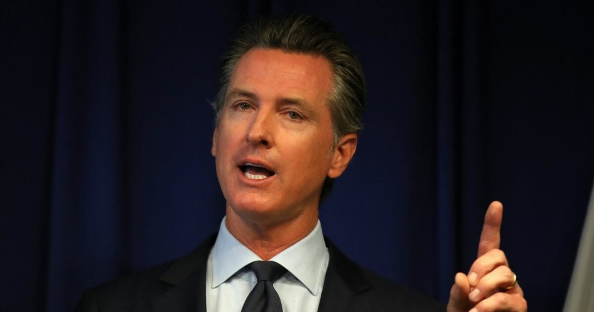 California Gov. Gavin Newsom speaks during a news conference at the California Justice Department on Sept. 18, 2019, in Sacramento, California.
