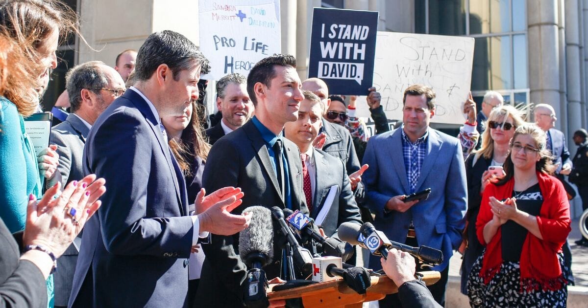 David Daleiden, founder of the pro-life group Center for Medical Progress, addresses a news conference in 2016 outside the courthouse in Harris County, Texas.